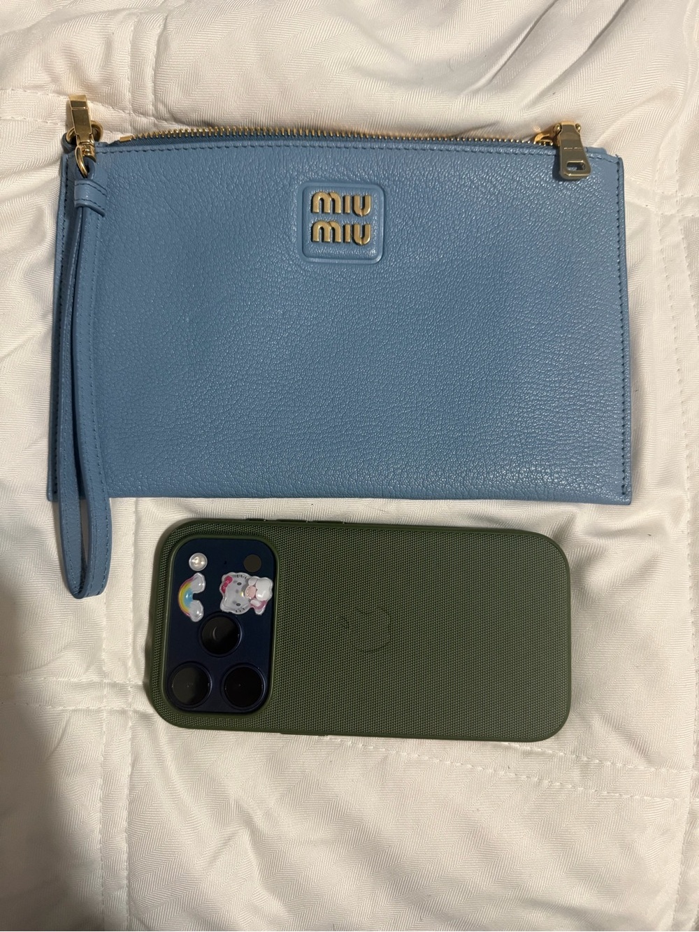 (Authentic) Miu Miu Madras leather clutch bag